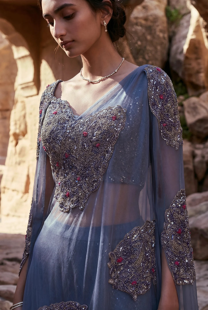 Draped blouse with laced flared pants