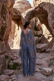 Draped blouse with laced flared pants