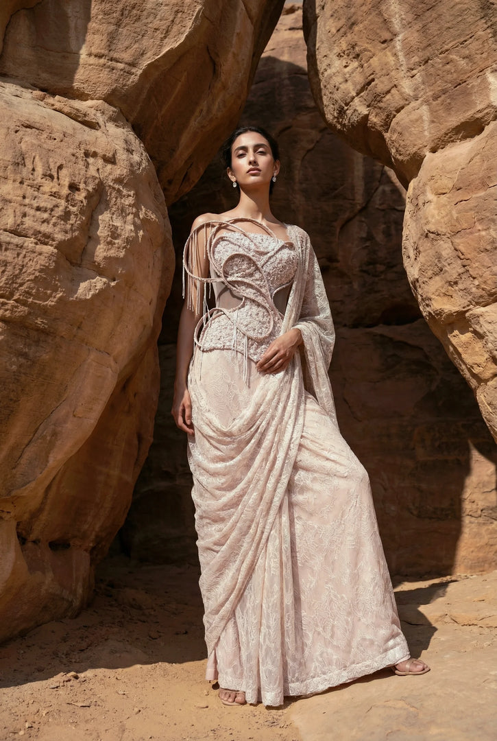 Draped saree with corset blouse