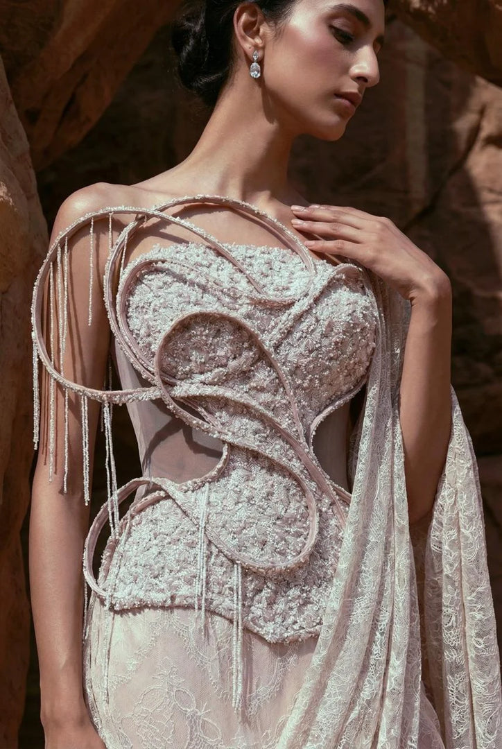 Draped saree with corset blouse