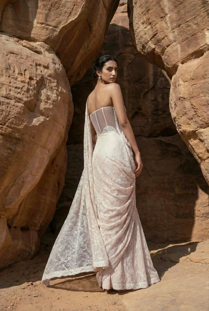Draped saree with corset blouse
