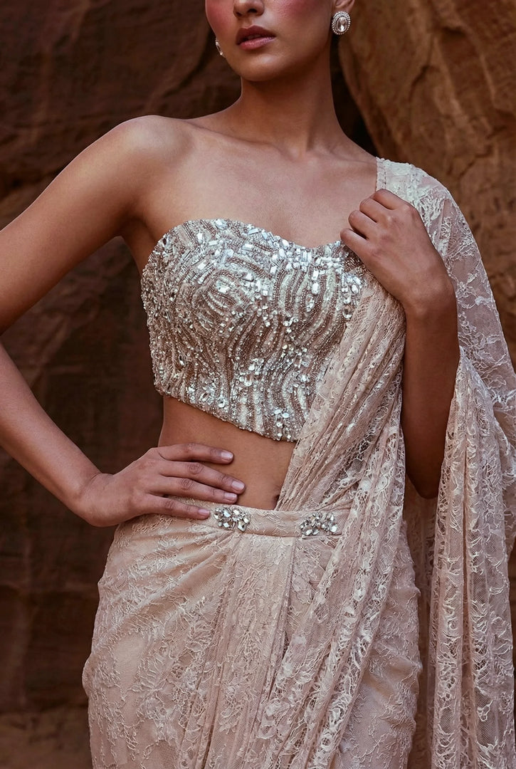 Draped saree with corset blouse