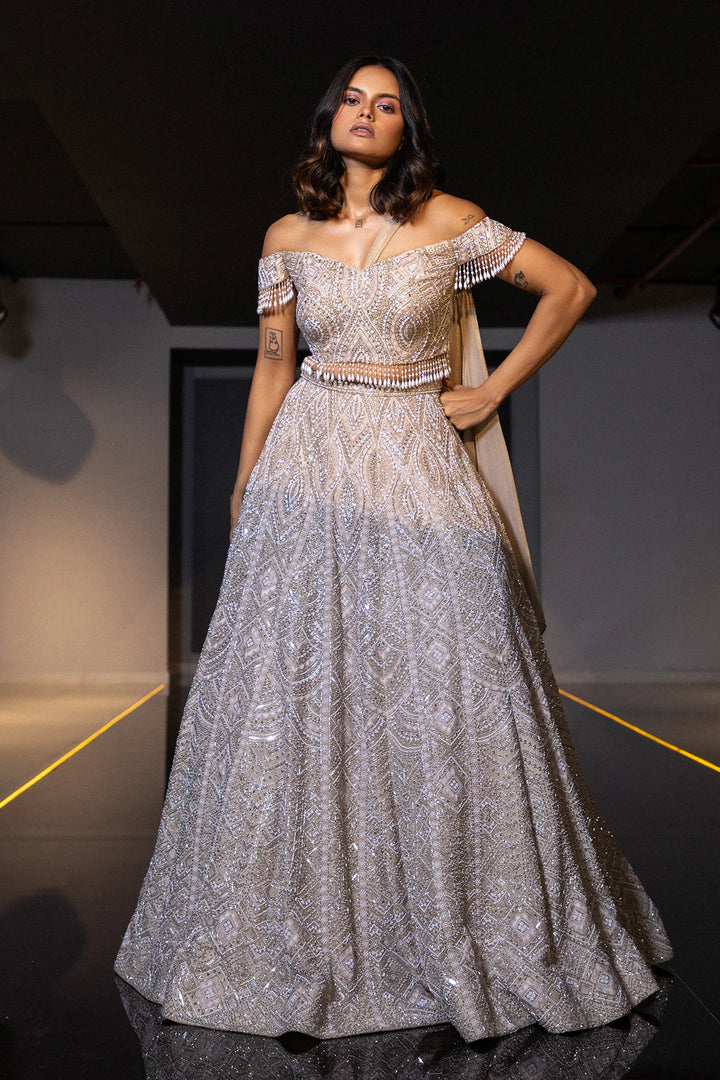 Champagne lehenga with stylised blouse